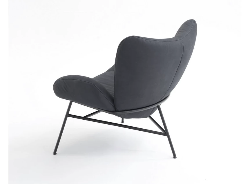 Achterkant Bijzetzetel Mellow leder Moome by Indera schuin achter rug