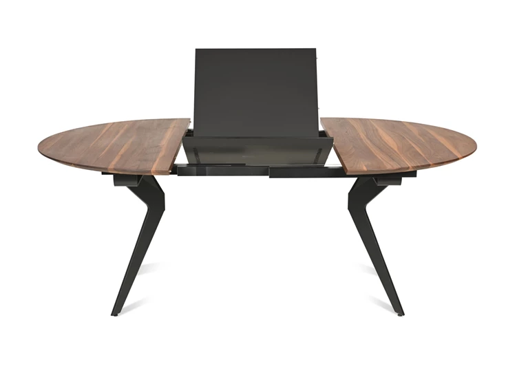 Open Tafel Capri rond verlengbaar massief hout Amerikaans noten Willisau Edition