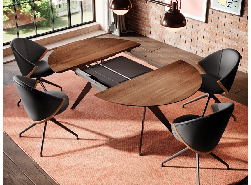 Sfeer open Tafel Capri rond verlengbaar massief hout Amerikaans noten Willisau Edition