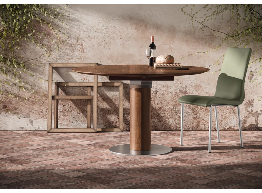 Sfeerfoto Verlengbare tafel Modena rond massief hout Amerikaans noten Willisau