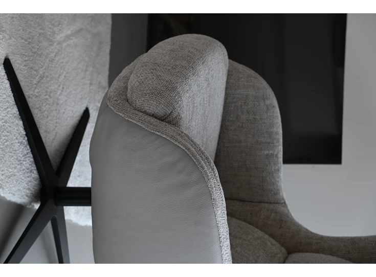 Fauteuil Gilbert op draaivoet in stof detail onder.jpg