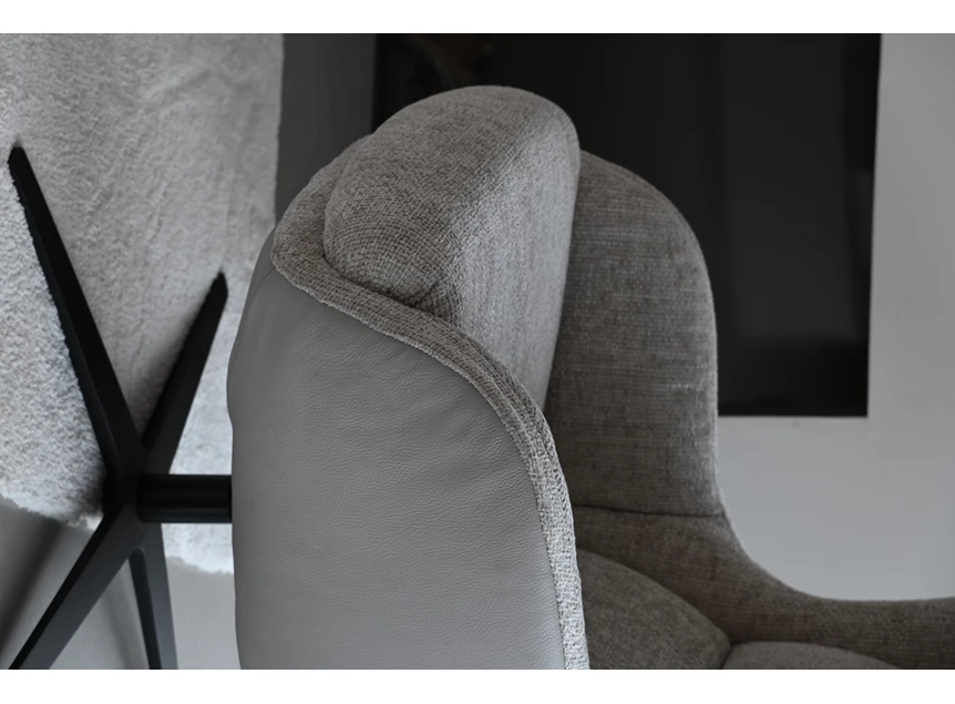 Fauteuil Gilbert op draaivoet in stof detail onder.jpg