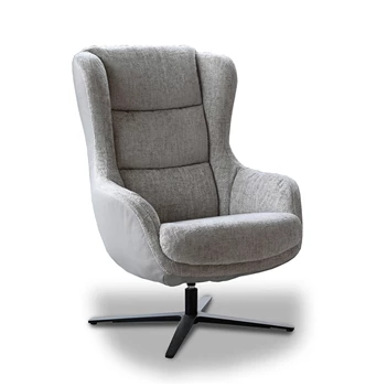 Fauteuil Gilbert op draaivoet in stof schuin vooraanzicht.jpg