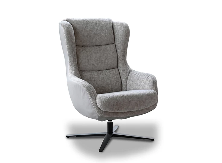 Fauteuil Gilbert op draaivoet in stof schuin vooraanzicht.jpg