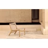 Sfeerfoto Bijzetzetel Teak Jack Outdoor lounge chair woven beige cord 10223 Ethnicraft